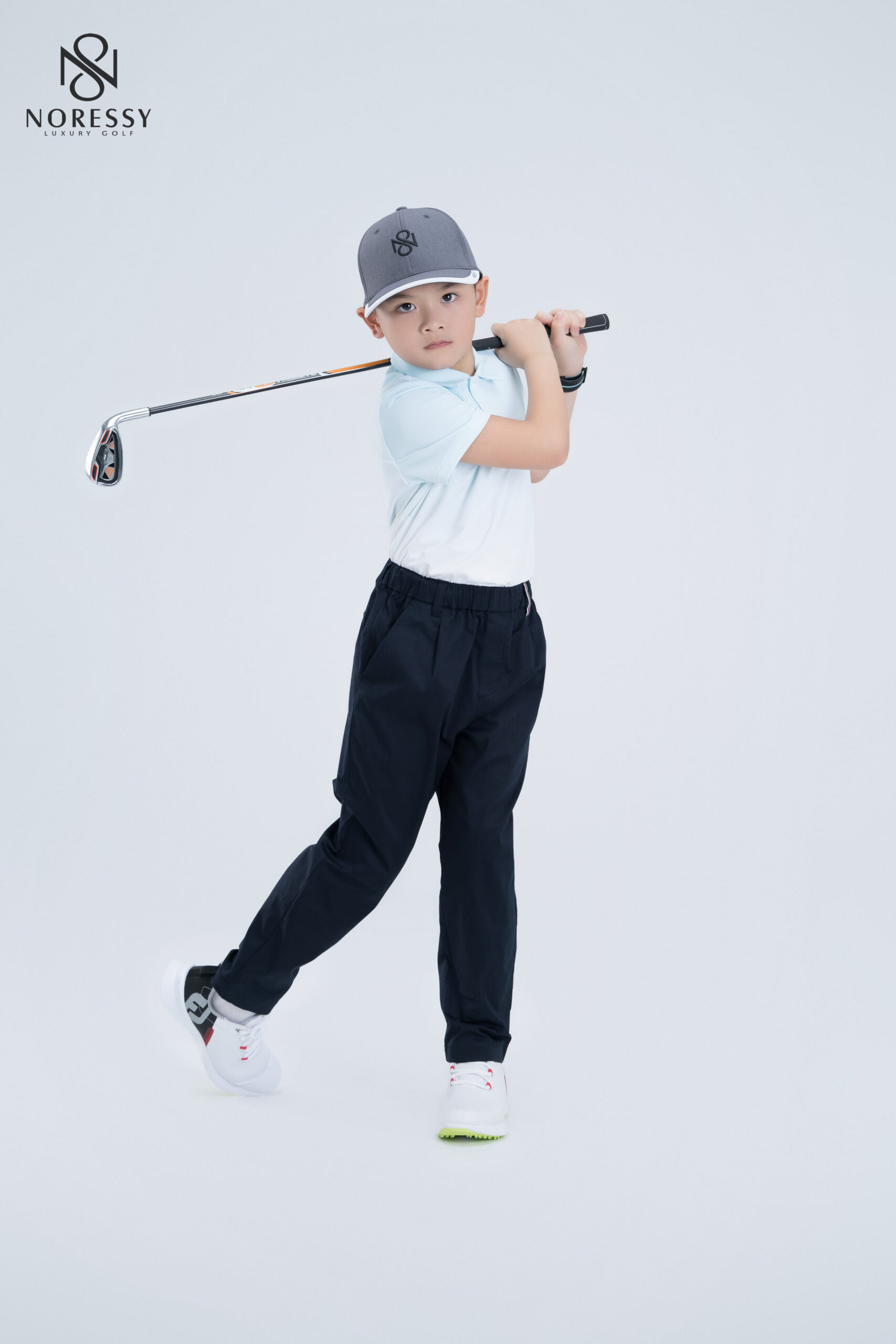 Dụng cụ golf có vai trò quan trọng trong việc dạy trẻ chơi golf